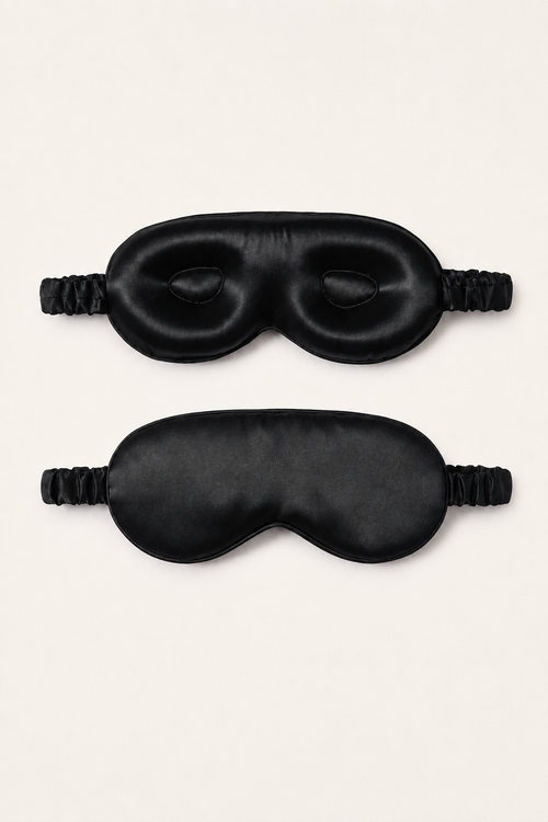 Front and back view of a black mulberry silk 3D sleep mask